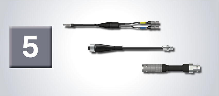 Vibration System Component #5 - an image of CTC CMX2005, CMX2203, CMX2502 data collector adapter cables on a grey gradient background